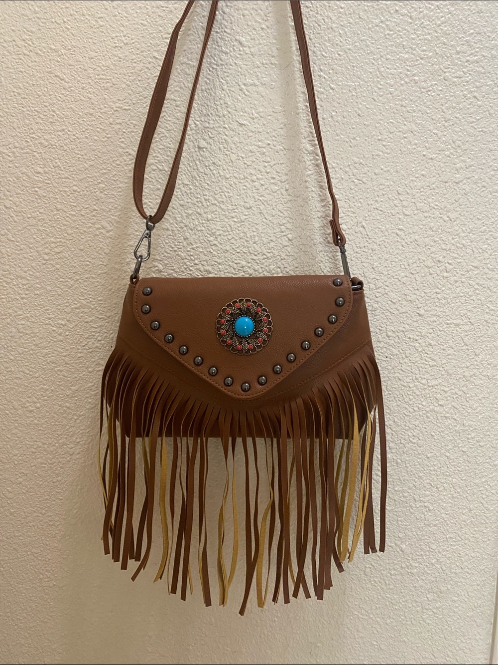 Tan Fringe faux leather Crossbody Bag with Turquoise Medallion Accent